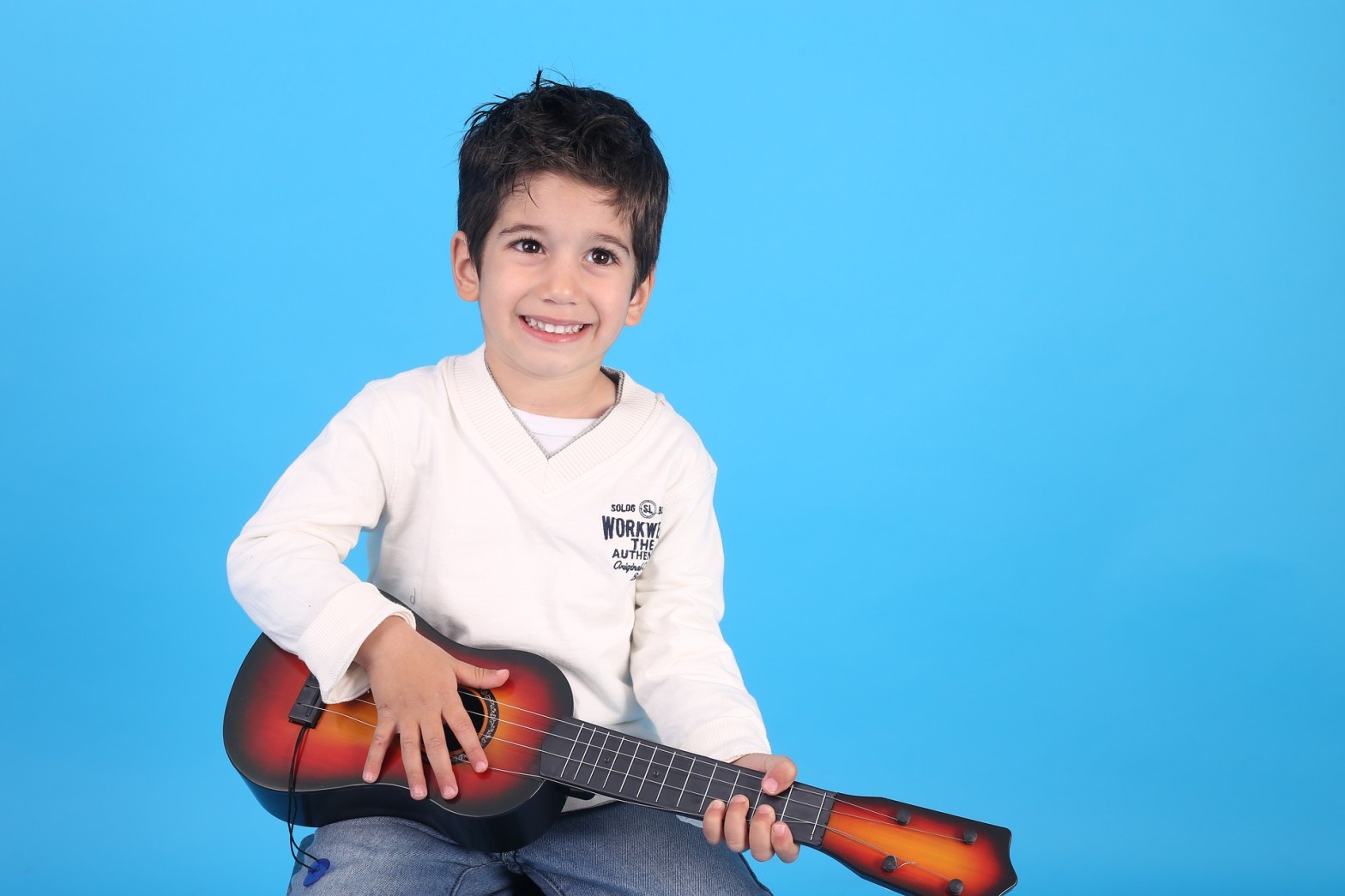 Boy Playing Guitar
